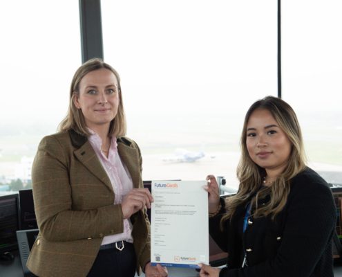 Pena Mason receiving her End-Point Assessment certificate from Futurequals's Elizabeth Pincombe-Stringer